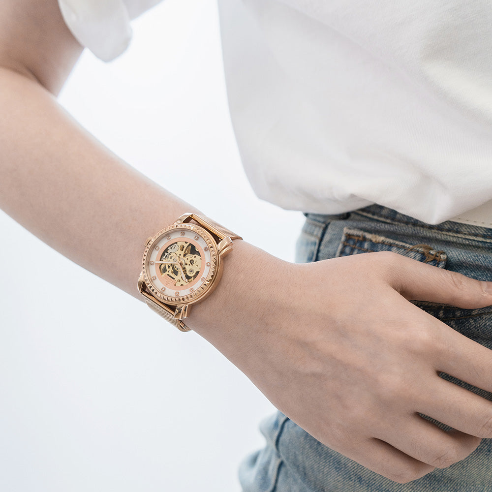 玫瑰金鏤空機械錶